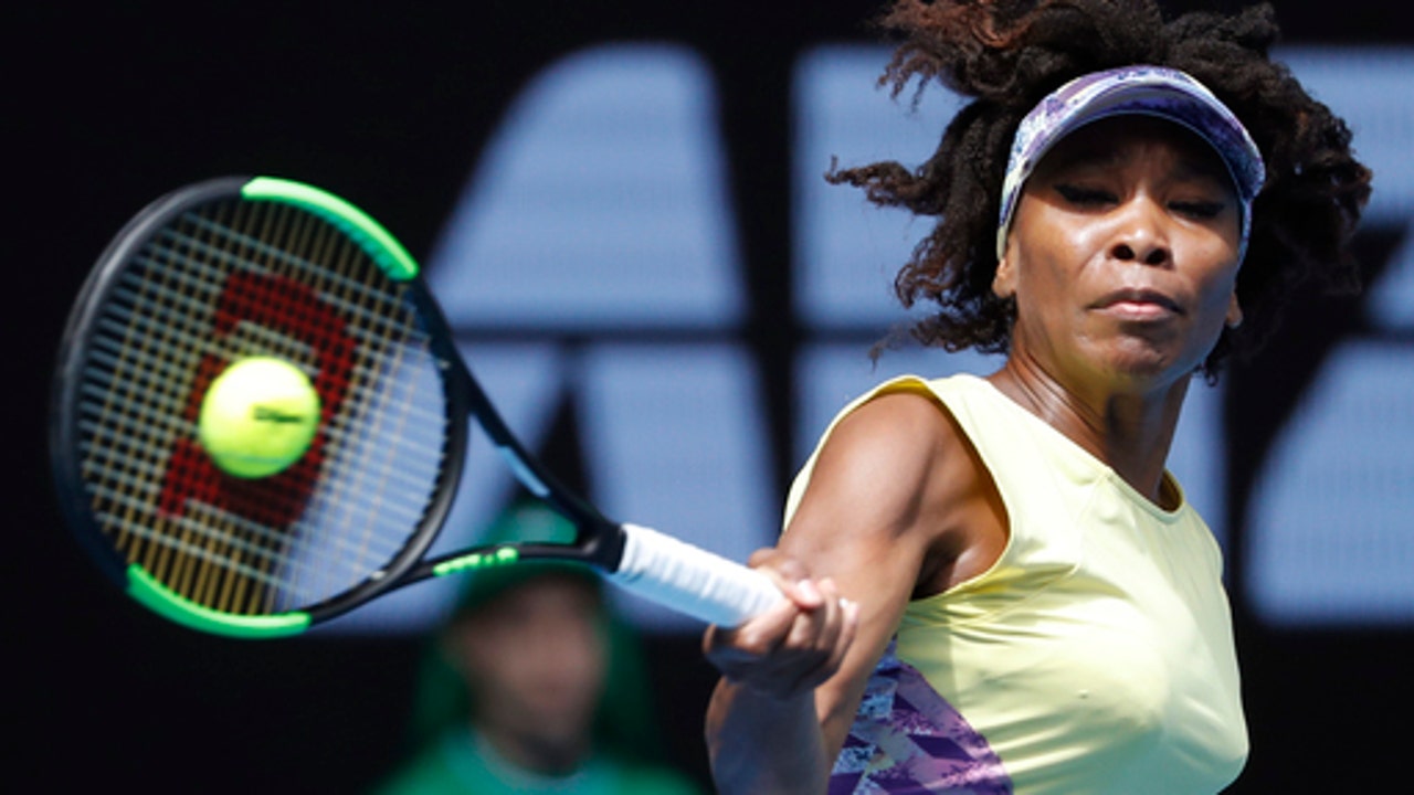 The Latest: Querrey's win ends run of 4 losses for US men